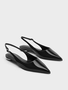 A business casual staple, these slingback flats are a must-have in every modern woman's wardrobe. With its sharp pointed toes and glossy black finish, its sleek profile will streamline your frame and instantly elevate even the simplest ensembles. For a hint of shine that still feels subtle, distinctive metallic accents on the heels set these shoes apart. These flats will go well with most outfits, or you can pair them with longer pants to nail the puddle pants look. Puddle Pants, Charles And Keith Shoes, Pointed Flats Shoes, Shoe Wishlist, Wide Heels, Pointed Flats, Slingback Flats, Faux Leather Heels, Pointed Heels