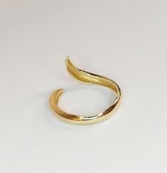 Beautiful shiny 14K solid Gold half twisted ring weighs around 2.5-2.8 grams, depending on your finger size. We are enthusiastic to design and produce new minimalist designs continuously, with diamonds or plain gold. The quality of the product will complete the shine of yourself. All our products are made to order, you can choose the finger size and metal of the gold, we can produce it as a white gold ring, rose gold ring, or yellow gold ring. The gold croissant dome ring will shine for years wi Gold Stacking Ring, Twisted Ring, Dome Ring, Minimalist Designs, Gift For Her Birthday, Gold Ring Stack, Domed Ring, Stacking Ring, Birthday Present