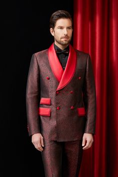 Stand out in this bold double breasted tuxedo for men or women with strong red accents that are great for any black tie event. This is great for big events, weddings, and any other formal event where you would like to add an additional pop of color to a formal evening. FREE SHIPPING ON ORDERS OVER $199 COLOR Red COMPOSITION N/A YARN COUNT N/A WEIGHT 290g FABRIC STYLE Jacquard OCCASION Wedding/Gala Luxury Double-breasted Tuxedo, Luxury Double-breasted Party Suits, Party Double Breasted Suit With Notch Lapel, Double-breasted Tuxedo For Wedding, Luxury Double-breasted Tuxedo For Formal Events, Luxury Double-breasted Tuxedo For Formal Occasions, Luxury Double-breasted Tuxedo For Semi-formal Occasions, Elegant Double-breasted Evening Tuxedo, Red Fitted Double-breasted Suit