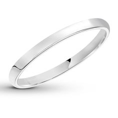 This classic wedding band is crafted of 14K white gold. The band is 2mm in width. Timeless White Gold Band With Smooth Bezel, Timeless White Gold Bands With Smooth Bezel, Classic Bands With Smooth Finish For Anniversary, Formal White Gold Ring With Smooth Bezel, Formal White Gold Rings With Smooth Bezel, Elegant Wedding Band With Smooth Finish, Wedding Ring With Smooth Finish And Round Band, Elegant Bands With Smooth Finish For Anniversary, Classic White Gold Ring With Smooth Bezel