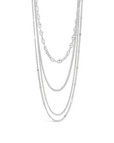 Behold fashion royalty: the Lulu Layered Necklace! Featuring a statement mix of chains, this bad boy will rock every neckline like a king or queen. So if you want to be bold and get noticed, Lulu's the one! Materials: 14K gold or rhodium plated brass Features: Measures 14-19" with 2" extender, 0.35" width, Lead & Nickel free, lobster clasp Metal Chain Link Layered Necklace, Metal Layered Chain Link Necklace, Multi-strand Silver Chain Necklace, Silver Multi-strand Metal Chain Necklace, Chunky Chain Layered Metal Necklace For Party, Chunky Chain Layered Necklace For Party, Chic Silver Layered Chain Necklace, Trendy Multi-strand Chain Necklace, Metal Multi-strand Chain Necklace