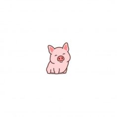 a small pink pig sitting on top of a white surface