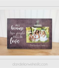 a family picture frame with the words, all because two people fell in love