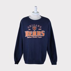 Vintage 90s Chicago Bears Football NFL Sweatshirt 💯 SATISFACTION AND AUTHENTICITY ⭐ MEASUREMENTS (when laid flat) Size on Tag: XL Length: 75cm or 29.5 inches Armpit to armpit: 65cm or 25.5 inches ⭐ CONDITION 9/10 (Very good) Details: No holes Material: Cotton Color: Dark Blue Navy Brand: NFL 🔷 Please give us your phone no. together with address after you purchased. 🔷Please keep in mind that our items are vintage so they may show some signs of wear and tear. All of items are pre-owned and, unf Throwback Long Sleeve T-shirt For College, Throwback Graphic Print T-shirt For Fall, Fall Throwback T-shirt With Letter Print, Fall Throwback Letter Print T-shirt, Throwback Crew Neck Tops For College, Throwback Fan Gear Tops For Fall, Vintage Crew Neck Top With Team Logo, Chicago Bears Gifts, Chicago Bears Sweatshirt