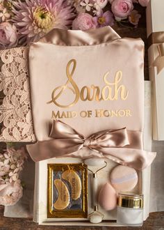 the bride's gift box is filled with personalized items