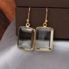 Green Amethyst Hydro Earrings, Dangle Earrings, Amethyst Gold Plated Jewelry, Brass Jewelry, Green Earrings, 20X15 MM Rectangle Drop Earring Item Details : Metal: Brass Material: Brass and Gemstone Gemstone: Green Amethyst Hydro Weight: 7.69 Gram Approx Stone Size: 20 X 15 MM Approx Product Code: HE-2881 ✤✤ Made To Order ✤✤ ✤✤ Handmade Item ✤✤ Buy these beautiful earrings and give the best choice to your loved ones. ❱❱ G E M S T O N E D E T A I L ❰❰ **Gemstone structure may vary from the image a Classic Earrings With Rectangular Stone For Gift, Classic Rectangular Stone Earrings For Gift, Classic Rectangular Stone Earrings As Gift, Classic Rectangular Party Earrings, Gold Rectangular Gemstone Earrings, Modern Earrings With Rectangular Stone Gift, Modern Earrings With Rectangular Stone For Gift, Modern Rectangular Stone Earrings For Gifting, Rectangular Crystal Earrings For Party