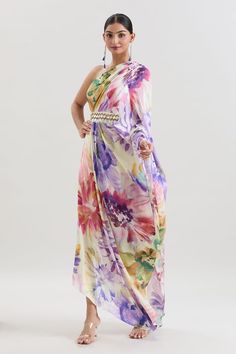 Multi colored one shoulder padded kaftan with abstract floral prints and pipes, coins embroidered patch. - Aza Fashions Festive One-shoulder Saree, Spring Party Saree With Floral Print, Multicolor Silk Saree For Spring, Party Multicolor Pre-draped Saree With Printed Motifs, Party Pre-draped Multicolor Saree With Printed Motifs, Spring Multicolor Floral Print Kaftan, Elegant Multicolor Floral Embroidered Kaftan, Festive Multicolor Floral Print Kaftan, Multicolor Floral Print Pre-draped Saree For Party