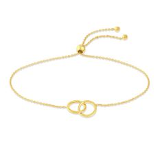 A meaningful interlocking circles shimmer elegantly in the center of this fabulous women's bolo bracelet. Fashioned in 14K yellow gold, the cable chain secures in place with a bolo clasp. Modern Yellow Gold Adjustable Jewelry, Timeless Adjustable Gold Bracelet With Solid Link, Elegant Yellow Gold Bracelet With Sliding Knot, Elegant Yellow Gold Bracelets With Sliding Knot, Elegant Gold Bracelet With Adjustable Length, Elegant Gold Bracelets With Adjustable Clasp, Adjustable Polished Yellow Gold Bracelet, Elegant Gold Lariat Bracelet, Modern Gold Jewelry With Sliding Knot