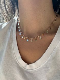 "Layer this beautiful star necklace with more of our necklaces.  18k gold filled  14\" length + 2\" extender  *18k gold filled is a more affordable alternative to solid gold jewelry. Gold filled is a layer of gold bonded onto a base metal with heat and pressure that contains 100+ times more gold than gold plated jewelry.  *It is very durable and tarnish resistant.  *With proper care, gold filled jewelry can last several years. Avoid contact with harsh chemicals, perfumes, water, etc.  *Gold filled jewelry can be worn by people with sensitive skin because it is hypoallergenic, lead free and nickel free.  If you have any questions, please message me." 14k Gold-filled Star Charm Jewelry, Trendy Gold Star-shaped Jewelry, Trendy Gold Star Shaped Jewelry, Trendy Gold Star Jewelry, Trendy Star-shaped Jewelry With Adjustable Chain, Trendy Star-shaped Charm Necklace With Adjustable Chain, Trendy Star Charm Necklace With Adjustable Chain, Adjustable Gold Jewelry With Star Charm, Trendy Star Charm Necklaces