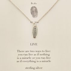 A sterling silver chain and oval pendant with the word "miracle" etched in it. This inspirational necklace carries deep meaning in its simplicity. The descriptive card includes the Albert Einstein quote: "There are two ways to live: you can live as if nothing is a miracle or you can live as if everything is a miracle." A simple, everyday reminder. Material: Sterling Silver Size: Approx. 16-18" L. chain, approx. 1/2" charm Designed in Italy by Mary Steratore, the creator of b.u. jewelry, and Hand Everyday Reminder, Chain And Pendant, Albert Einstein Quotes, Einstein Quotes, Deep Meaning, Oval Pendant, Designer Gifts, Albert Einstein, Sterling Silver Chain