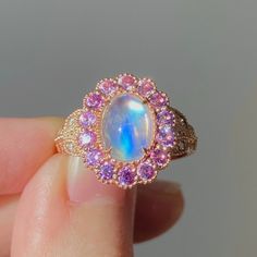 Edwardian Rainbow Moonstone With Pink Sapphire Halo Ring. - Etsy Opalescent Sapphire Ring, Pink Moonstone Jewelry Gift, Pink Halo Diamond Ring, Pink Sapphire Jewelry As A Gift, Pink Opal Gemstone Ring For Anniversary, Sapphire Moonstone Ring Fine Jewelry Gift, Handmade Rose Gold Moonstone Ring For Anniversary, Pink Opal Ring With Accent Stones As Gift, Pink Moonstone Promise Ring