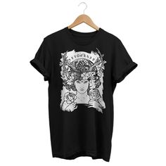 "This is a occult horoscope t-shirt for a mystic witchy style. This cool zodiac shirt is perfect for modern witches and wizards, and priestess of the sacred feminine, Wicca and pagan cults. This tee is a perfect witch gift for witchy women, powerful women, witchy teen girls, teen boys, goth people. . Do you prefer a different color print or color t-shirt? No problem, send me a message with your request so i can confirm and print it as YOU like. Do you want one of the prints on hoodies, kids size Graphic Tee For Alternative Fashion, Unisex Alternative Style T-shirt With Screen Print, Alternative Fashion Graphic Print Tee, Band Merch T-shirt With Screen Print For Alternative Fashion, Graphic Tee With Alternative Fashion Design, Black T-shirt With Sublimation Print For Alternative Fashion, Graphic Tee With Graphic Design As Gift, Graphic Tee With Graphic Design For Gift, Graphic Tee Tops As Gift