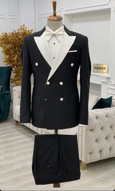 Fitted Pantsuit With Button Closure For Semi-formal Occasions, Formal Long Sleeve Sets With Hidden Button Closure, Tuxedo Style Semi-formal Pantsuit With Double Button Closure, Semi-formal Tuxedo Style Pantsuit With Double Button, Tuxedo Style Pantsuit With Notch Lapel, Tailored Double-breasted Tuxedo Pantsuit, Tuxedo Style Pantsuit With Suit Collar For Semi-formal, Slim Fit Long Sleeve Suit With Double Button Closure, Fitted Double-breasted Suits With Long Sleeves