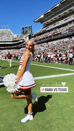 a woman in a cheerleader outfit is dancing on the field at a football game