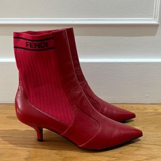 Never Worn Fendi Red Leather Ankle Boots With Elasticated Ankle, Low Heel, Very Comfortable Size - 37 Color - Red. Fall Boots With Red Sole In Calf Leather, Fall Calf Leather Boots With Red Sole, Designer Ankle Boots With Red Sole, Luxury Boots With Red Sole For Fall, Designer Heeled Boots With Pointed Toe For Winter, Luxury Fall Boots With Red Sole, Designer Red Boots For Fall, Red Pointed Toe Calf Leather Boots, Designer Red Pointed Toe Boots