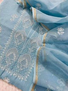 Item Overview ATHARVA Hand Embroidery Salwar Kameez Light Blue/Lucknowi Chikankari/Kota Doria Dupatta/Custom Stitch Unstitch/Custom Anarkali/Gift/ Dno. LUCK08 Fabric: * Shirt: Chanderi Silk- Lucknowi Chikankari Embroidery on Neck and All over Jaal/ 2.5 Mts Beautiful Hand Embroidery * Dupatta:Kota Doria Embroidery Dupatta 2.5Mts/All over Embroidery/ Lucknowi Chikankari * Bottom Santoon Silk 2.5 Mts. *Anarkali Style - - Increased Embroidery All Over the Panel -4.5Mts to 5 Mts Shirt Fabric used -4. Blue Semi-stitched Churidar With Resham Embroidery, Blue Mulmul Anarkali Set For Eid, Blue Mulmul Lawn Suit With Straight Kurta, Blue Mulmul Anarkali Set With Straight Kurta, Unstitched Blue Lawn Suit With Dupatta, Blue Cotton Anarkali Set For Eid, Blue Straight Kurta Lawn Suit In Mulmul, Blue Mulmul Anarkali Set, Blue Mulmul Anarkali Set For Diwali