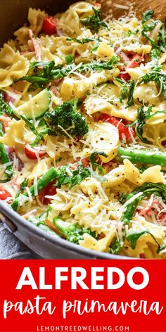 a pan filled with pasta and broccoli covered in cheese