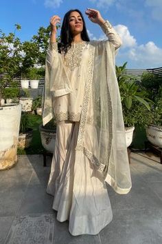 Shop for Neha Khullar White Cotton Shantoon Chanderi Silk Kurta Gharara Set for Women Online at Aza Fashions Gharara Designs, Desi Dress, Trendy Outfits Indian, Desi Wedding Dresses, Traditional Indian Dress, Desi Fashion Casual, Pakistani Fancy Dresses, Beautiful Pakistani Dresses, Indian Dresses Traditional