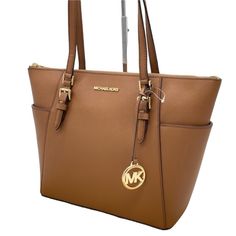 Brand New With Tag Michael Kors Large Charlotte Shoulder Tote Bag Color: Luggage 100% Leather Gold-Tone Hardware 15"W 10"H 4.75"D Handle Drop: 10" Exterior Details: 2 Side Slip Pockets Interior Details: Back Zip Pocket, 2 Front Slip Pockets Lining: 100% Polyester Zip Fastening Imported Classic Michael Kors Shoulder Bag For Travel, Classic Michael Kors Shoulder Bag In Cognac, Classic Michael Kors Tan Shoulder Bag, Classic Tan Michael Kors Shoulder Bag, Michael Kors Classic Brown Bag, Classic Michael Kors Shoulder Bag With Leather Lining, Michael Kors Travel Bags With Leather Lining, Michael Kors Rectangular Bag With Leather Lining, Exterior Details