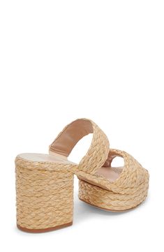 Braided raffia lends artisanal-inspired texture to a sun-ready slide sandal lifted by a chunky block heel and platform for all-day comfort with every step. 3 1/2" heel; 1 1/4" platform Synthetic upper, lining and sole Made in Brazil Chic Straw Sandals In Natural Color, Spring Sandals With Stacked Heel In Natural Color, Natural Sandals With Stacked Heel For Spring, Chic Natural Straw Heels, Chic Natural Heels For Vacation, Chic Natural Heels For The Beach, Chic Natural Heels For Beach, Chic Natural Color Heels For Vacation, Natural Straw Wedge Heel Sandals