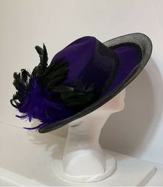 STUNNING VINTAGE Ellie  PURPLE HAT with BLACK FEATHERS 100% Wool Condition: EXCELLENT Classic Black Hat For Costume, Vintage Black Mini Hat For Spring, Vintage Black Mini Hats For Summer, Black Mini Hat For Vintage Events And Kentucky Derby, Retro Black Hat For Spring, Vintage Fitted Mini Hat With Flat Brim, Black Wide Brim Retro Hat, Vintage Black Hat For Spring, Vintage Black Fedora Hat