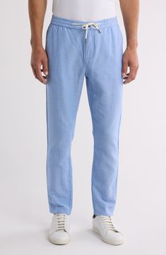 Designed with a modern slim fit and versatile hue, these flat-front pants are sure to keep you looking sharp. Elastic/drawstring waist; zip fly with button closure Front slant pockets; back welt pockets 67% organic cotton, 33% linen Machine wash, tumble dry Imported Blue Slim Fit Casual Pants, Casual Blue Slim Fit Pants, Spring Relaxed Fit Straight Pants, Fitted Straight Leg Pull-on Sweatpants, Casual Pants With Comfort Waistband And Straight Hem, Straight Hem Pants With Comfort Waistband For Elevated Casual, Elevated Casual Pants With Comfort Waistband, Casual Slim Fit Blue Bottoms, Slim Fit Blue Bottoms For Summer