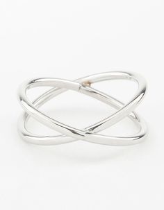 Make a statement in a stunning fashion ring. Stack with other styles for extra impact or wear alone for a refined addition to your ensemble. This ring features a crossover design in a silver tone. Weight: 3.0g | Lovisa Silver Crossover X Ring, Size: Small/Medium Elegant Metal Stackable Rings For Formal Occasions, Elegant Metal Stackable Rings For Formal Events, Modern Metal Midi Rings For Formal Occasions, Elegant Stackable Metal Rings With Open Band, Elegant Metal Open Band Stackable Rings, Elegant Silver Rings For Spring, Metal Rings For Formal Occasions With A Modern Twist, Chic Silver Wedding Ring, Elegant Open Band Midi Rings