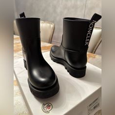 Women Moncler Black And White Boots Wore Once Pull-On Boot With A Small Platform And A Small Logo. ( No Returns ) Black And White Boots, Moncler Women, Pull On Boots, White Boots, Rain Boots, Black White, Women Shoes, Black And White, Boots