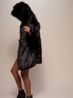 Women's Faux Fur Coat - Hooded Our Faux Fur Coat for Women in Black Wolf features an oversized hood, deep cozy pockets and gorgeous custom wolf buttons. This best-selling shaggy faux fur coat is perfect to wear with all your cute outfits. Black Wolf Characteristics LOYALTY • CONFIDENCE • WISDOMThe Black Wolf lives in truth and integrity. With a confident spirit, the Black Wolf lifts its head to shamelessly howl - communicating what needs to be heard to those in the pack. A Black Wolf strives to Wolf Characteristics, Faux Fur Coat Black, Shaggy Faux Fur Coat, Wolf Life, Faux Fur Hooded Coat, Womens Faux Fur Coat, Black Faux Fur Coat, Hooded Faux, Inner Wisdom