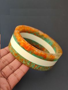 "you will receive 1 piece of Handmade resin bangle Bracelet Colorful Resin Stacking Bracelet  Modern Trendy jewelry Gift For Women Inner diameter= 2.6\" approx. Material: Resin Quantity: 1 Piece Thank you very much for visiting! Any questions, please feel free to contact us. Discount for bulk provide." Handmade Orange Cuff Bracelet Bangle, Handmade Orange Bangle Cuff Bracelet, Handmade Orange Cuff Bangle, Resin Bracelets As Gifts, Retro Handmade Bangle Jewelry, Handmade Orange Cuff Bracelet Gift, Vintage Handmade White Cuff Bracelet, Resin Bangle Jewelry For Gifts, Resin Bangle Jewelry Gift