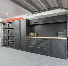 the garage is clean and ready to be used for work or other tasks, as well as storage