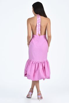 This stunning midi dress boasts a halter style and a deep plunging V-neckline for a feminine touch. It features floral embroidery inspired by the Tree of Life and a peplum flounce bottom for added flare. Perfect for any occasion, this dress is both stylish and comfortable. Backless Ruffle Hem Dress For Brunch, Backless Brunch Dress With Ruffle Hem, Backless Dress With Ruffle Hem For Garden Party, Flirty Backless Dress With Ruffle Hem, Spring V-neck Halter Dress For Garden Party, Fitted Backless Midi Dress For Brunch, Chic Backless Midi Dress With Ruffles, Party Midi Dress With Ruffled Skirt, Feminine Backless Midi Dress With Tie Back