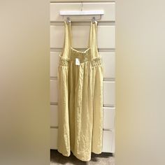 Free People Smocked Midi Dress / Size M / Light Yellow/Crme Color / Nwt Chic Beige Smocked Dress, Chic Beige Smock Dresses, Chic Beige Smocked Dress With Smocked Back, Beige Maxi Dress With Smocked Bodice For Daywear, Beige Sleeveless Smocked Dress, Sleeveless Beige Smocked Dress, Beige Smocked Sundress With Smocked Bodice, Summer Beige Smocked Dress With Smocked Back, Beige Summer Smocked Dress With Smocked Back