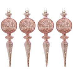 four pink glass ornaments are lined up on top of each other