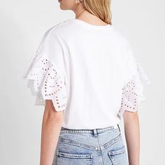 Express Short Eyelet Ruffle Sleeve Drawstring Bottom Tee Color: White Size: Large New Without Tags Feminine Summer Tops With Eyelet Details, Feminine Eyelet Tops For Summer, Feminine Crew Neck Top For Spring, Feminine Ruffled Short Sleeve T-shirt, Casual Tops With Ruffle Sleeves For Daywear, Feminine Short Sleeve T-shirt With Ruffles, Feminine Ruffle T-shirt For Spring, Trendy Ruffle Sleeve Tops For Summer, Chic Ruffle Sleeve Top For Daywear