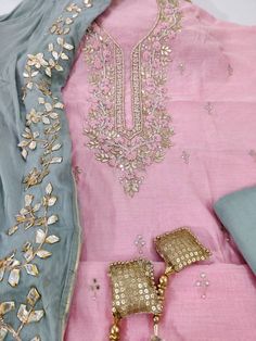 Item Overview ATHARVA Hand Embroidery Salwar Kameez/Pink Chanderi Silk/Grey Gota Patti Chiffon Dupatta/Custom Stitch Unstitch/Churridar/Anarkali Dno. CH1715 Fabric: * Shirt - Chanderi Silk- Hand Embroidered Neck 2.5 Mts - Beautiful Hand Embroidery * Dupatta: Chiffon Chinnon Dupatta/ All over Gota Patti Embroidery - 2.5 Mts- Latkans Tassels * Bottom Santoon Silk 2.5 Mts. (Doesn't require lining in stitching) Excusive Hand Embroidered Party Wear Punjabi Suit. Customization: * Fabrics Customization Semi-stitched Pink Salwar Kameez With Mirror Work, Unstitched Pink Salwar Kameez With Mirror Work, Festive Pink Unstitched Suit With Mirror Work, Pink Chanderi Salwar Kameez With Mirror Work, Designer Pink Salwar Kameez With Mirror Work, Pink Unstitched Suit With Mirror Work For Eid, Transitional Pink Unstitched Suit With Resham Embroidery, Pink Anarkali Unstitched Suit With Mirror Work, Pink Chinon Unstitched Suit For Diwali