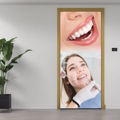 an open door with the image of a woman's teeth on it