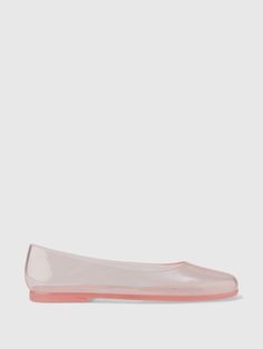 These flats are made with a translucent jelly plastic upper.  Rubber gripper sole.  For more fit and sizing info, check out our Size Guide. Pink Flat Jelly Sandals, Pink Flat Plastic Jelly Sandals, Casual Flat Plastic Jelly Sandals, Casual Jelly Sandals With Translucent Outsole, Casual Slip-on Jelly Sandals With Translucent Outsole, Casual Translucent Jelly Sandals, Slip-on, Casual Translucent Slip-on Jelly Sandals, Non-slip Flat Jelly Sandals, Clear Plastic Jelly Sandals For Spring