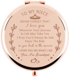 a compact mirror with the words to my niece on it