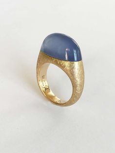 For Sale on 1stdibs - Dalben design 18k yellow gold ring with a 13 carat bezel-set Namibian Chalcedony. Ring size 7 - EU 54 . The ring is completely handmade in our atelier Formal Domed Cabochon Sapphire Ring, Formal Yellow Gold Cabochon Sapphire Ring, Luxury Domed Cabochon Rings, Timeless Round Cabochon Sapphire Ring, Classic Yellow Gold Sapphire Ring With Cabochon, Elegant Yellow Gold Sapphire Cabochon Ring, Luxury Yellow Gold Oval Cabochon Rings, Modern Yellow Gold Cabochon Rings, Oval Dome Ring With Smooth Bezel For Formal Occasions