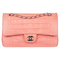 This Chanel Medium Double Classic Flap Bag is truly a rare gem. This model is no longer produced, making it a must-have item for any bag collector. Constructed from coral pink matte crocodile leather and silver tone hardware, it is the perfect combination of luxury and style. Brand: Chanel Product: Medium Double Classic Flap Bag Size: L 25.5 X H 17 X 7 Cm Colour: Coral Pink Material: Matte Crocodile Leather Hardware: Silver-Tone Series: 20 | 2014 - 2015 Condition: Excellent: The product has been worn and shows minimal signs of usage. It may have minor cosmetic imperfections, including minor stains, abrasions and scratches. Accompanied By: Chanel Box, Dust Bag & Authenticity Card Chanel Crocodile Bag, Chanel Box, Pink Things, Classic Flap Bag, Crocodile Bags, Leather Hardware, Jane Birkin, Rare Gems, Crocodile Leather