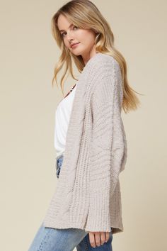 Comfort and style all in one! Our In The Moment Taupe Cardigan is a textured knit, open front cardigan perfect for layering. Model Measurements: Height 5'9". Wearing a size Small. Taupe Cardigan, Textured Knit, Open Front Cardigan, Front Open, All In One, Bell Sleeve Top, Layering, Tunic Tops, Graphic Sweatshirt