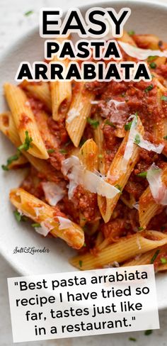 pasta with sauce and parmesan cheese in a white bowl that says easy pasta arrabiata