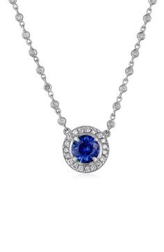 A diamond bezel chain trickles down to a brilliant sapphire pendant haloed in pavé diamonds and cast in 18-karat gold. 18" length Total sapphire weight: 2.12ct. Total diamond weight: 2.12ct. Color: G–H Clarity: VS 18k gold/diamond/sapphire Made in the USA >Diamond Guide Luxury Round Sapphire Diamond Necklace, Formal Sapphire Necklace With Single Cut Diamonds, Sapphire Round Diamond Necklace In Fine Jewelry Style, Sapphire Diamond Necklace In Round Shape, Sapphire Diamond Necklace Fine Jewelry, Sapphire Diamond Round Necklace, Dazzling Sapphire Jewelry With Pave Setting, Sapphire Pendant With Single Cut Diamonds, Sapphire Necklace With Brilliant Cut