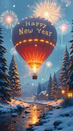 a hot air balloon with fireworks in the sky above snow covered trees and water at night