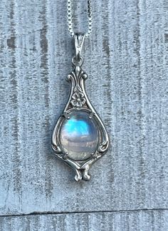 "Vintage Moonstone Pendant/Sterling Silver/June Birthstone/Free Shipping/Gift For Her/Rainbow Moon Stone/Women's Jewelry/Antique Style Gifts ** These Vintage Style Moonstone Pendants are Handmade to Order. The processing time for these pieces is 1 week ** This gorgeous pendant has the look of an Antique piece but is absolutely brand new and Handcrafted with Love! Made of Solid .925 Sterling Silver, you can be assured you are receiving a high quality piece of jewelry. It features four prongs, whi Rainbow Moonstone Necklace, Jewelry Antique, June Birthstone, Moonstone Necklace, Moonstone Jewelry, Moonstone Pendant, Fantasy Jewelry, June Birth Stone, Dream Jewelry