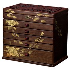 a wooden jewelry box with flowers painted on the front and sides, along with two drawers