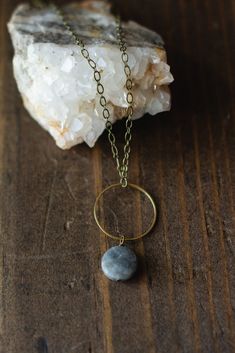 This beautiful statement necklace features a raw brass circle pendant and a labradorite gem on an antiqued brass chain. It works wonderfully alone or as a layering piece! We will ship the necklace in a gift box in a bubble mailer to prevent damage to it. Have a lovely day! Brass Circle, Bubble Mailer, Lovely Day, Circle Pendant, Brass Chain, Raw Brass, Pendant Necklaces, Antique Brass, Labradorite