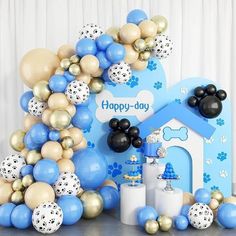 a birthday party with balloons and decorations for a dog themed baby's first birthday