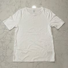 Nwot - Large Gap White Graphic Tee T-shirt, White Graphic Tee By Gap, White Gap Graphic Tee, Classic Everyday Gap Tops, White Relaxed Fit T-shirt By Gap, Classic Everyday Tops From Gap, Classic Gap Tops For Everyday, Gap Short Sleeve Tops For Everyday, Gap Crew Neck Everyday T-shirt